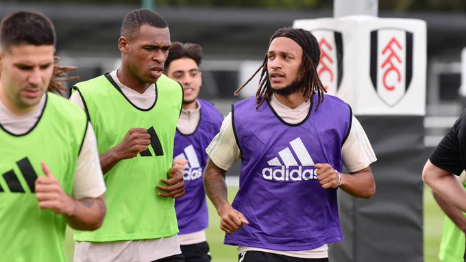 Issa Diop and Kevin Mbabu pictured running during training.
