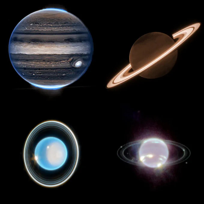 The four giant planets of the solar system as seen in the infrared by JWST. Jupiter is top left with light and dark bands of grey, the Great Red Spot in pale blue, and blue aurorae at both poles. Saturn is top right, a dark orange planet surrounded by glowing orange rings. Uranus is bottom left, a bright blue orb with a cloudy white spot and its rings tilted up and down. Neptune is bottom right, show in faint pinks and yellows with two thin rings and several bright moons.