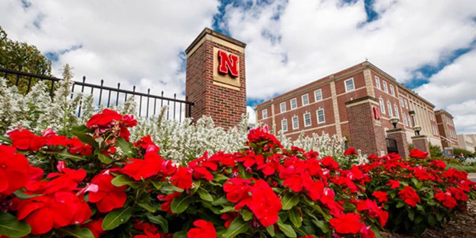Flowers blooming at the entrance of UNL's campus to promote the Doc Elliott award nominations ➡️ https://go.unl.edu/me7v