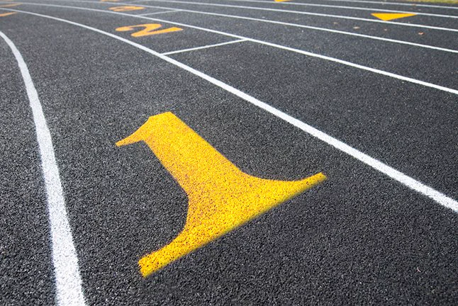 Image: A track with numbered lanes. 