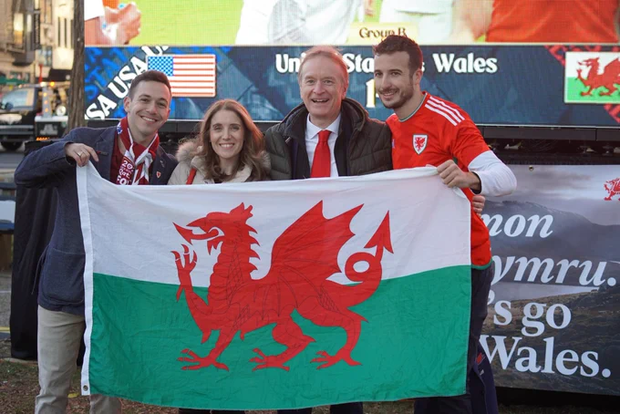 The Welsh Government’s DC team takes a picture with the Welsh flag at the Soccer in the Circle event.