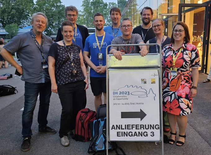 9 members of the IDE at the DH2023 conference.