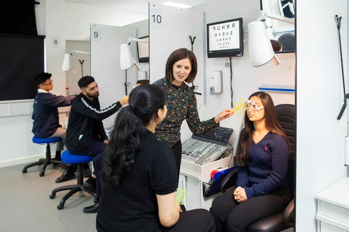 Optometry students in a teaching session