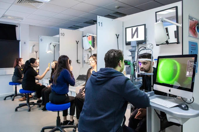 Optometry students in a teaching session