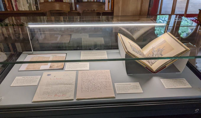Photograph of a different, closed display case of containing letters, documents and books pertaining to T.E. Lawrence
