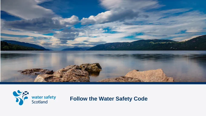 Image of open water, rocks and blue sky