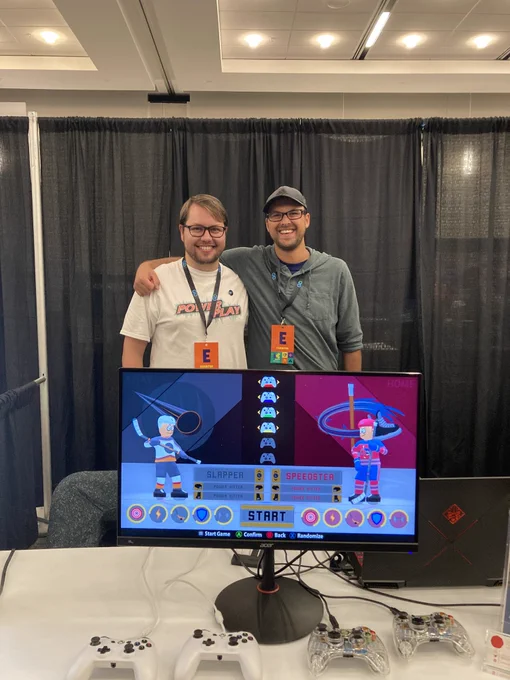 The two developers of PolyHobby Studios showing off their hockey video game in development, PowerPlay.