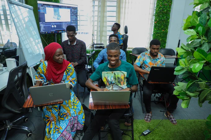 Group of young people working on computers at the Ghana Innovation Hub