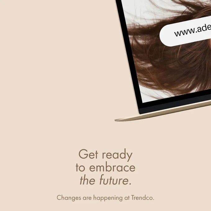 Get ready to embrace the future, changes are happening at Trendco. Image teasing a laptop screen with a half-hidden URL. Coming soon...