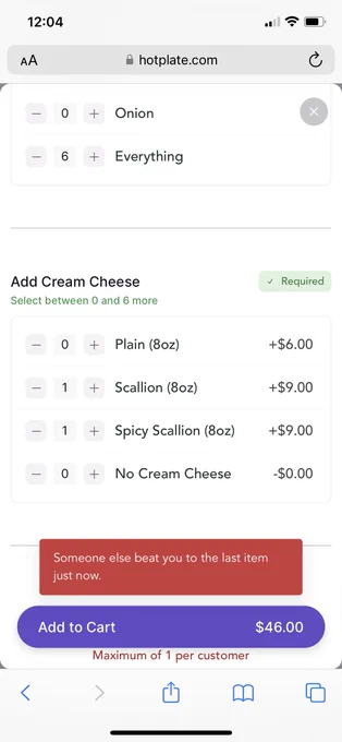 Screenshot from mobile order page, which does have an "Add to Cart" button, but also says "Someone else beat you to the last item just now" which is... possibly the worst info box?! Also shown is part of the bagel and cream cheese order I was trying to place.