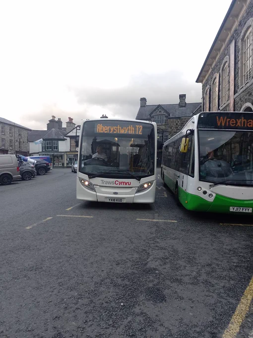 A photo of YX18 KUD, an ADL Enviro200 operated by Lloyds Coaches as part of th TrawsCymru network, running on route T2 to Aberystwyth. Taken at Dolgellau Eldon Square.