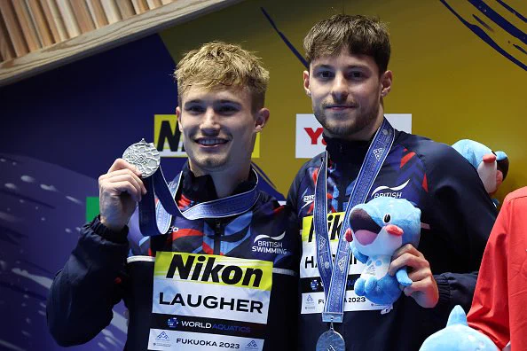 Jack Laugher and Anthony Harding pose with their Men’s 3m Synchro silver medals at the World Championships in Fukuoka