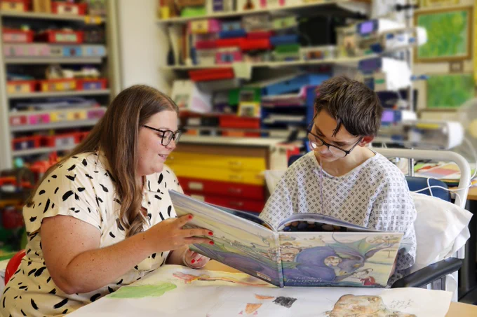 Teacher and student in St George's Hospital classroom