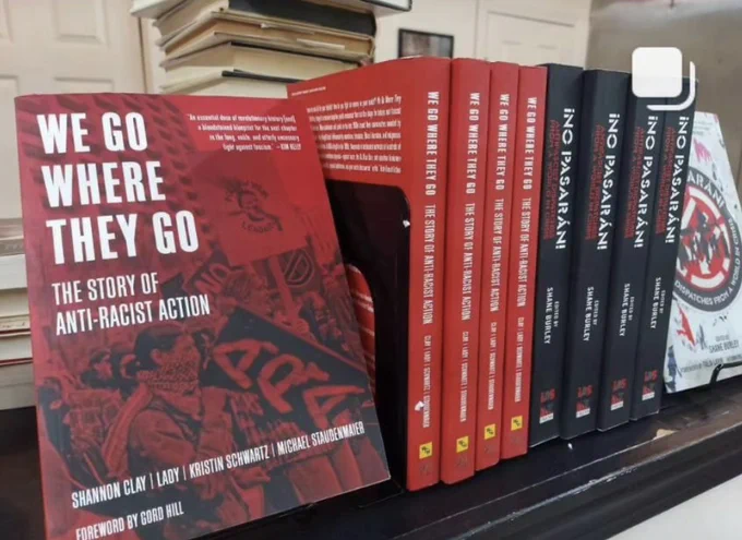 Display at Community Books, Stone Mountain, GA of the books We Go Where they Go: The Story of Anti-Racist Action (@pmpress) and No Pasaran: Antifascist Dispatches from a World in Crisis.