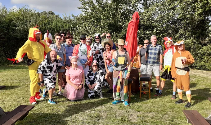 Photo taken in the beer garden of the Four Elms pub. Runners dressed in fancy dress based on a countryside theme.