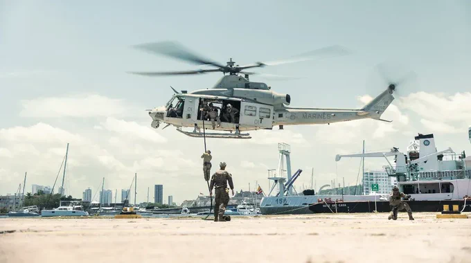 U.S. Marines with 4th Reconnaissance Battalion, 4th Marine Division, and members of partner nation special operation forces conduct helicopter rope suspension tactics training from a U.S. Marine Corps UH-1Y Venom during UNITAS LXIV at Cartagena, Colombia, July 13, 2023. (U.S. Marine Corps photo by Sgt. Colton K. Garrett)