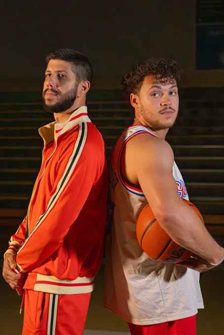 SoMo and Moonlander stand on a basketball court looking fresh and clean.
