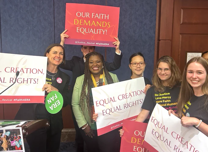 #Faith4ERA advocates hold signs that read: "Our Faith Demands Equality" and "Equal Creation, Equal Rights!" They pose for a photo with Rep. Cori Bush.