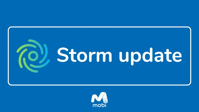 An image showing an icon representing a hurricane, with the headline "Storm update" in a rounded-rectangle box, on a blue background, with a solid white Mobi logo.