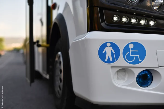 A bus that has designated places for disabled and elderly persons.
