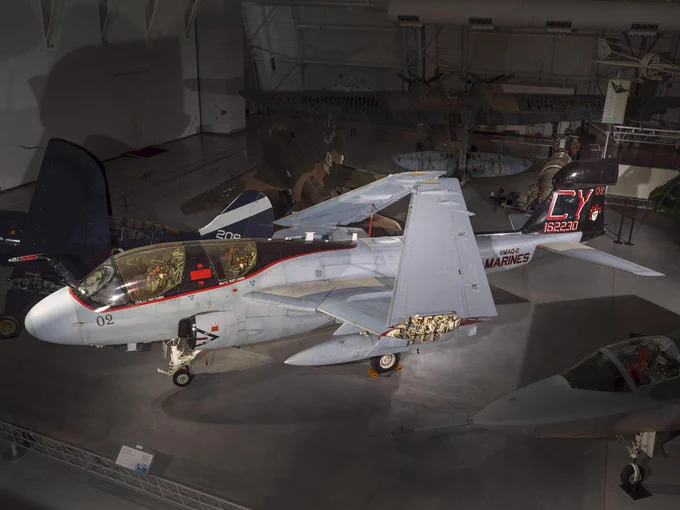 EA-6B Grumman Prowler (a grey military jet) on display in a museum setting.