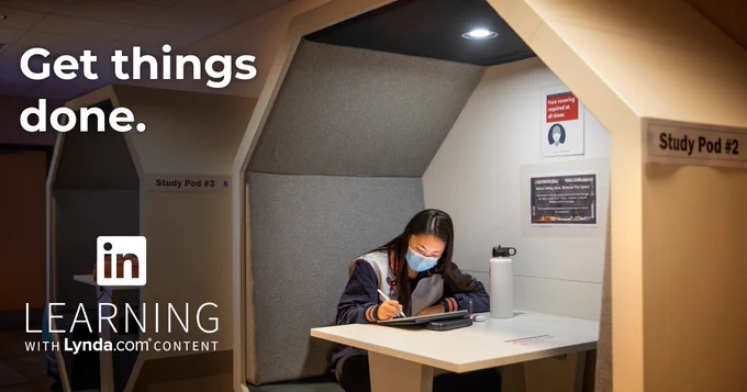 Student studying in a pod on campus.