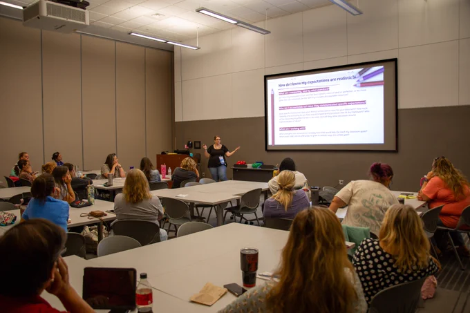 Jennifer Barker (Arlington ISD) presents to a room full of participants at the Special Programs Summer Conference.