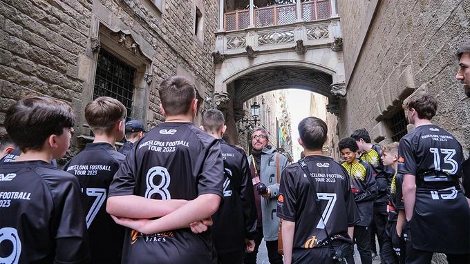 Students listen to a guide through the Gothic Quarter in Barcelona on a Rayburn sports tour