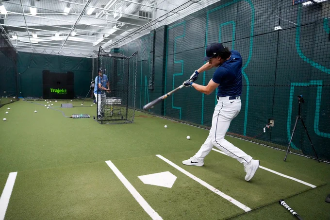 Jonny Farmelo in the batting cages taking a few swings. 