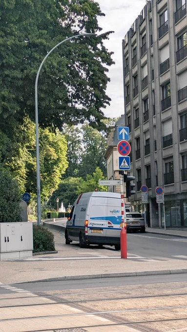 The bike lane, with a JC Decaux mini van blocking the entrance 