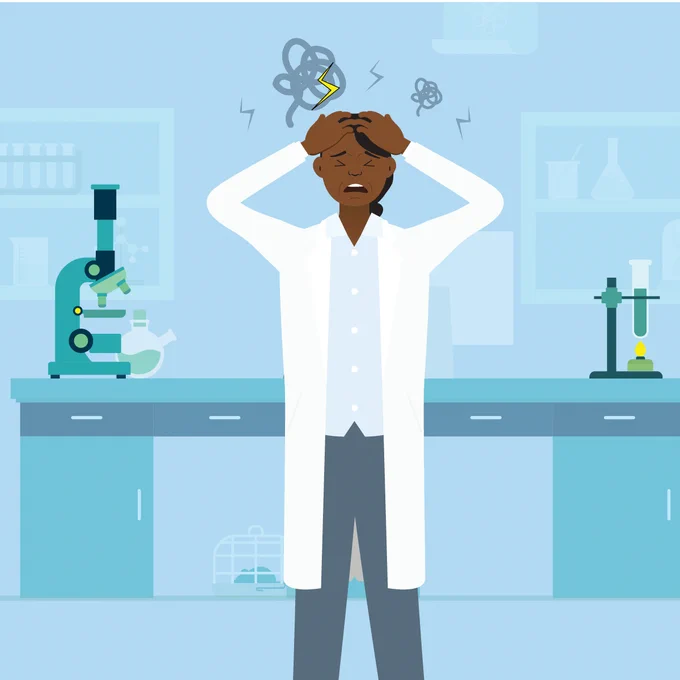 Cartoon scientist getting frazzled in the lab