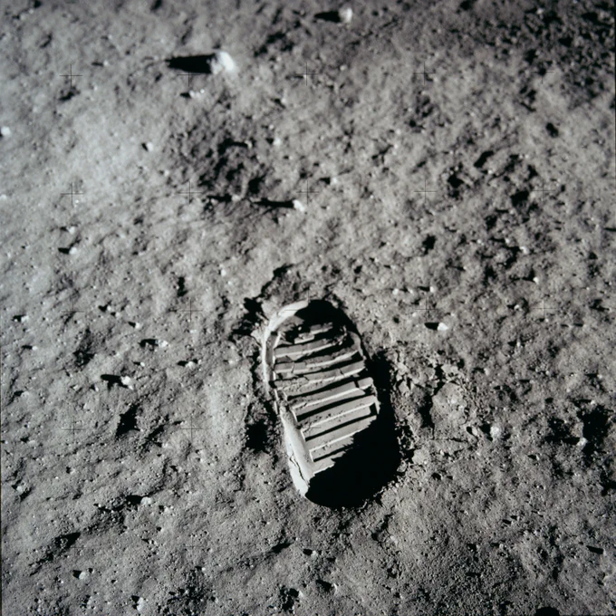 An astronaut bootprint on the lunar surface.