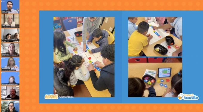 This photo shows students arranging printed coding blocks in the correct sequence to create a program. 