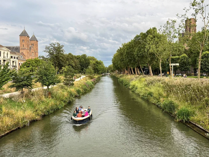 Beautiful canal with boat.