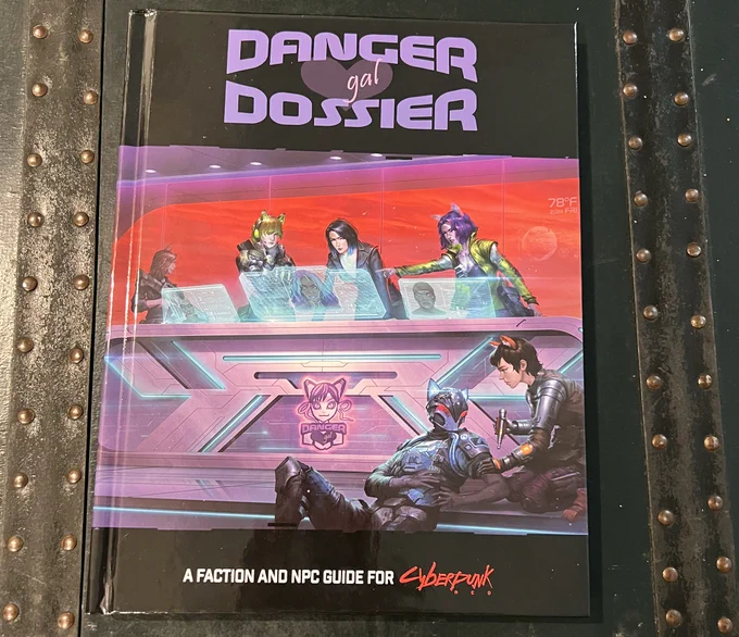 A physical copy of Danger Gal Dossier.