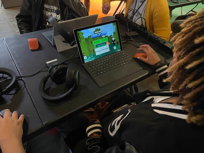 Student playing Minecraft Education.