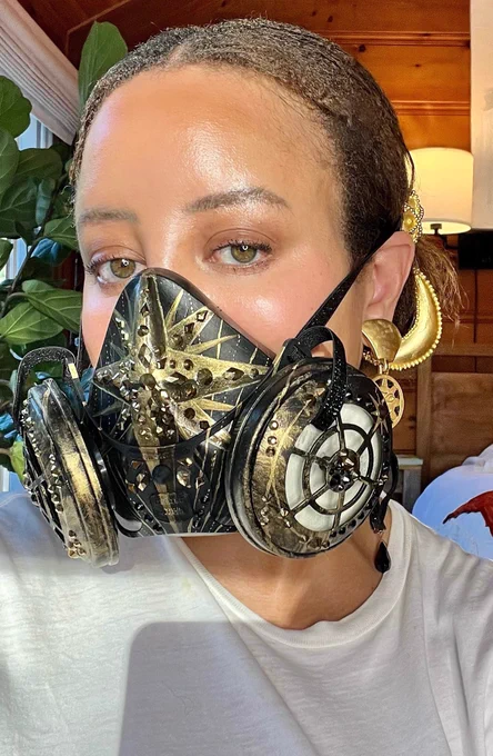 Me wearing a highly embellished black and gold elastomeric