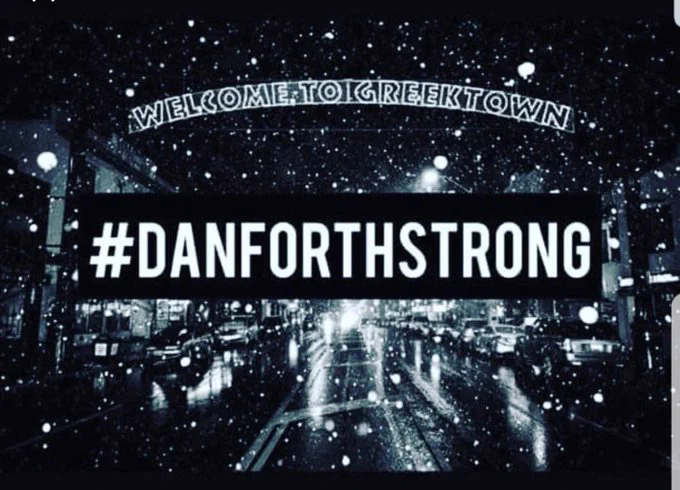 Photo of Danforth Avenue with text that says #DanforthStrong