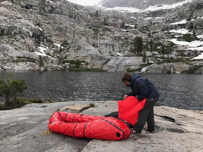 From the blog: Fig 2. Emily Jacinto inflates a packraft at a mountain lake in the Sequoia-Kings Canyon National Park. Photo by Christine Parisek.
