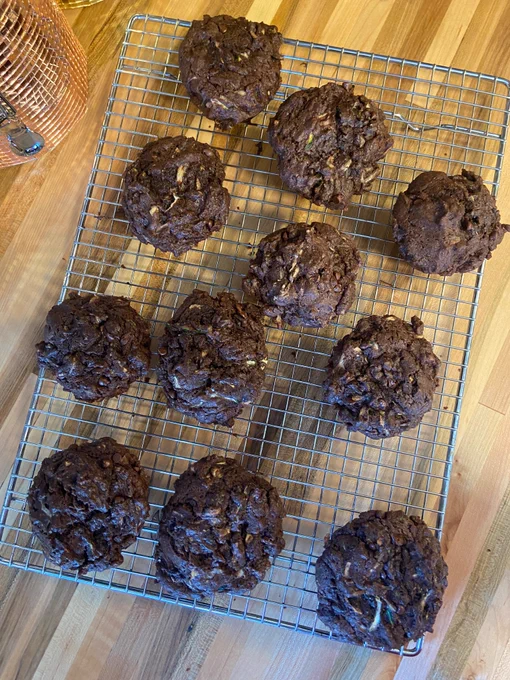 Chocolate zucchini muffins on a cooling rack 