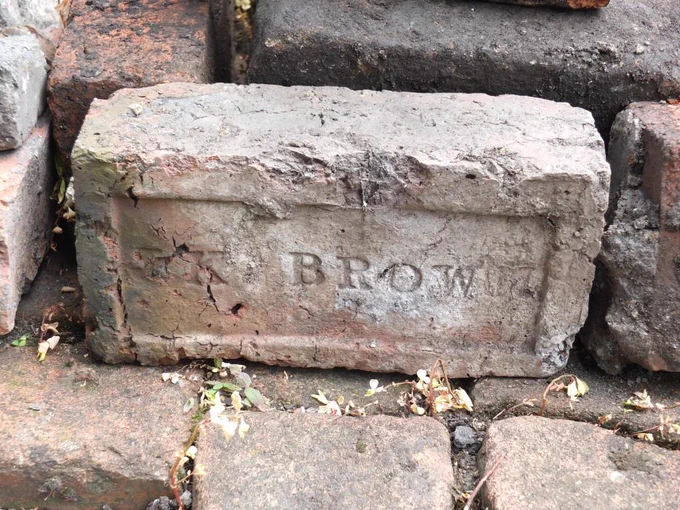 A brick with JK Brown on the front
