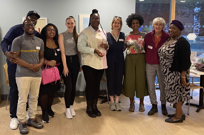 A group of staff from Rathbone’s youth programme standing with Helen Hayes MP, Cllr Ibtisam Adem, Cllr Jackie Meldrum and Cllr Christine Banton