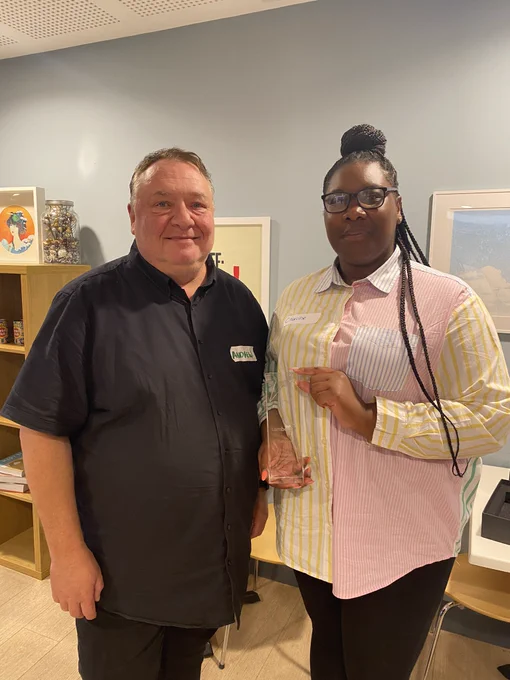 Rathbone CEO Andrew Preston and Youth Work Manager Charline King holding a national award for Rathbone’s holiday activities & food programme