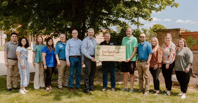 Johnny Garcia, Nicole Galarza and Jenna Berendzen assisted with presenting a Foundation Grant to Better Together Playground at the Springfield branch. 