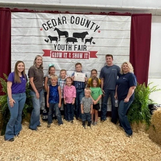 Dylan Shupp joined the Nevada branch in presenting Eastern Star 4-H Club's Shaping Rural Missouri Grant at the Cedar County fair in Stockton.