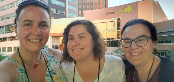 Three warm botanists cheese it up for the camera in front of Boise Center: me, Kathryn Turner, and Jill Hamilton, director of trees
