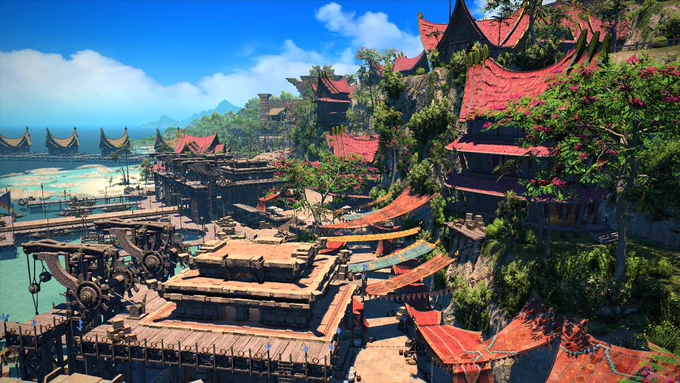 An aerial screenshot of Tuliyollal, showing multiple buildings with red roofs among trees near the port.