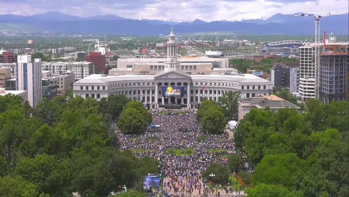 Denver Nuggets fans celebrating a NBA championship and crowd Civic Center Park. 