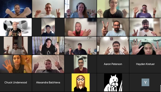 Participants of iOSDevHappyHour in a Zoom meeting, holding up their hands as either rock paper or scissors