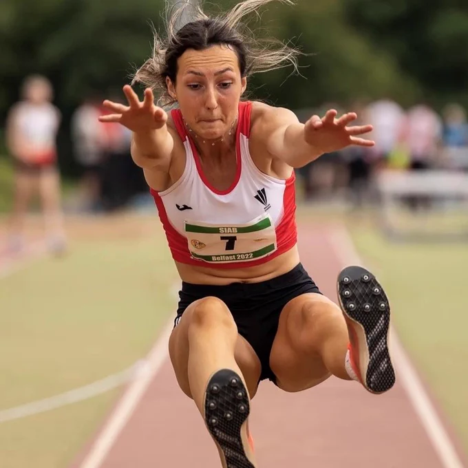 Jessica Lee competing in the long jump at the 2022 SIAB Track & Field Championships.